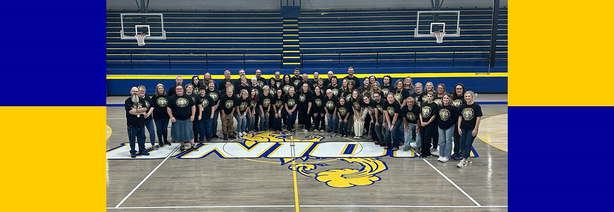 Staff photo in high school gym